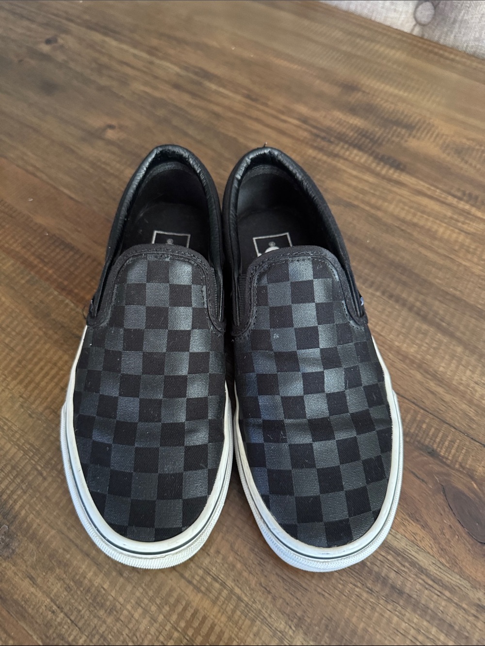 Black Checkered Vans Slip-On Sneakers